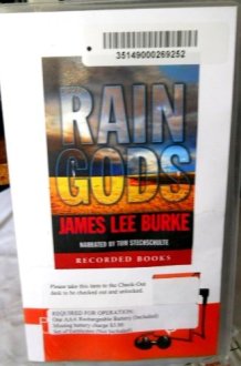 Rain Gods: A Novel [Unabridged] Playaway Audio by James Lee Burke (Author), Tom Stechschulte (Narrator) cover image
